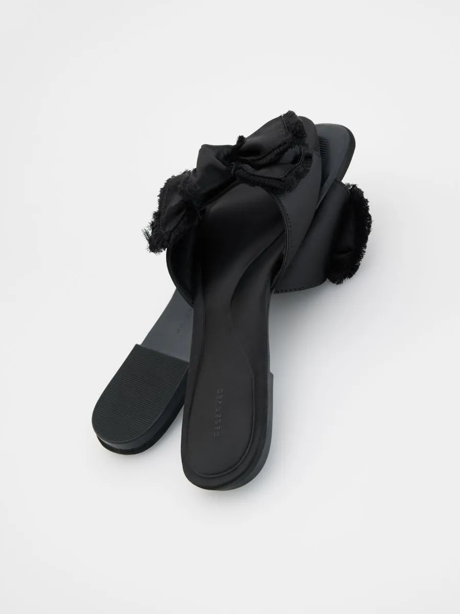 Sliders with bow detail